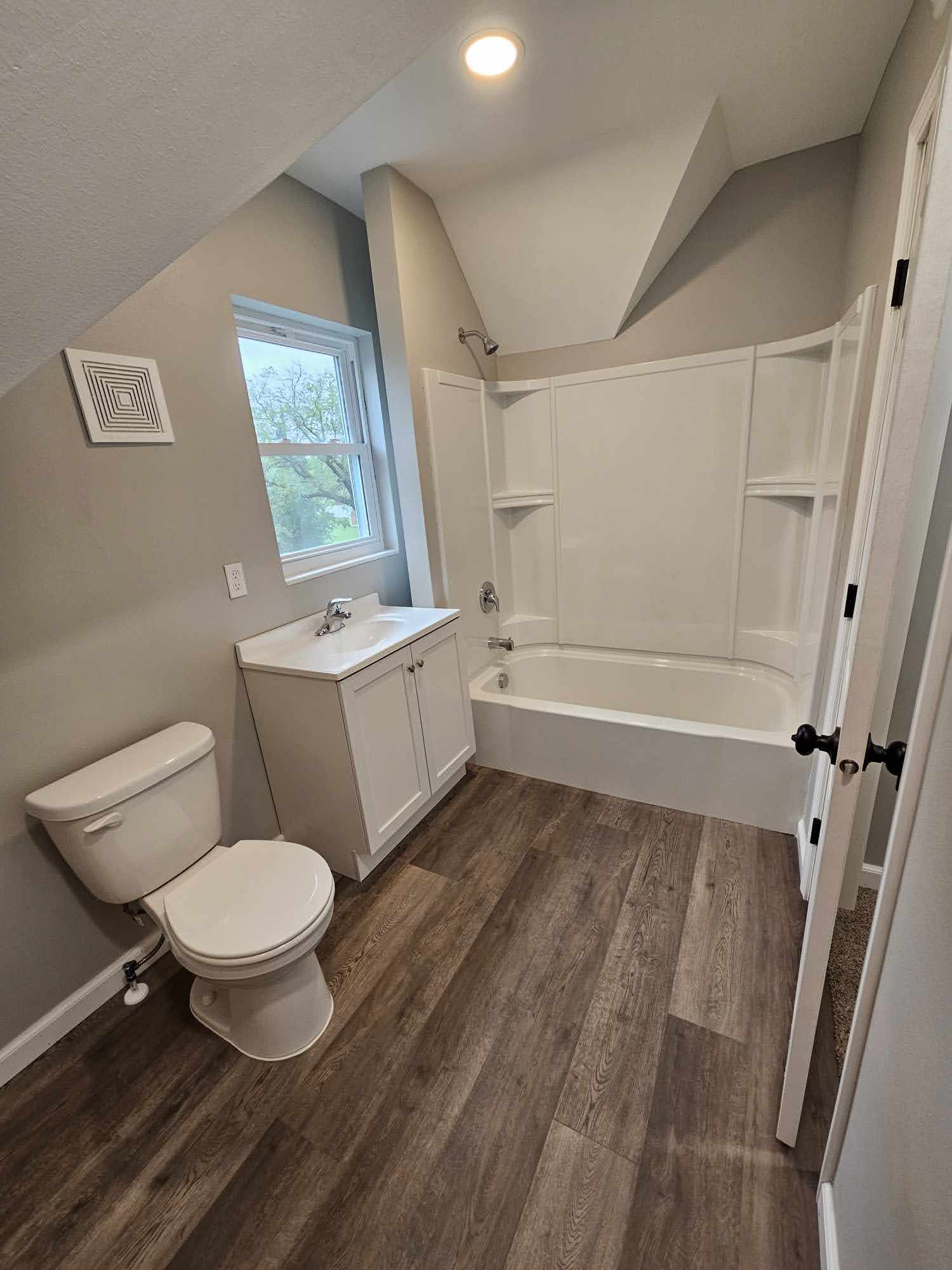 Updated full bathroom with tub and shower